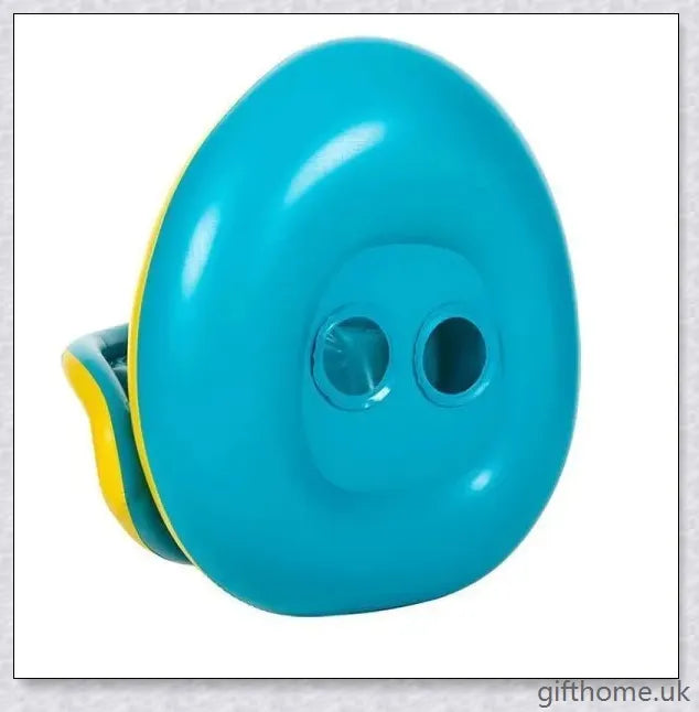 A baby swimming in a blue and white clamshell-style inflatable swimming pool float with a sun canopy and steering wheel