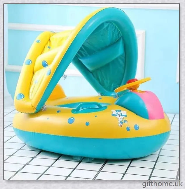 A baby swimming in a blue and white clamshell-style inflatable swimming pool float with a sun canopy and steering wheel
