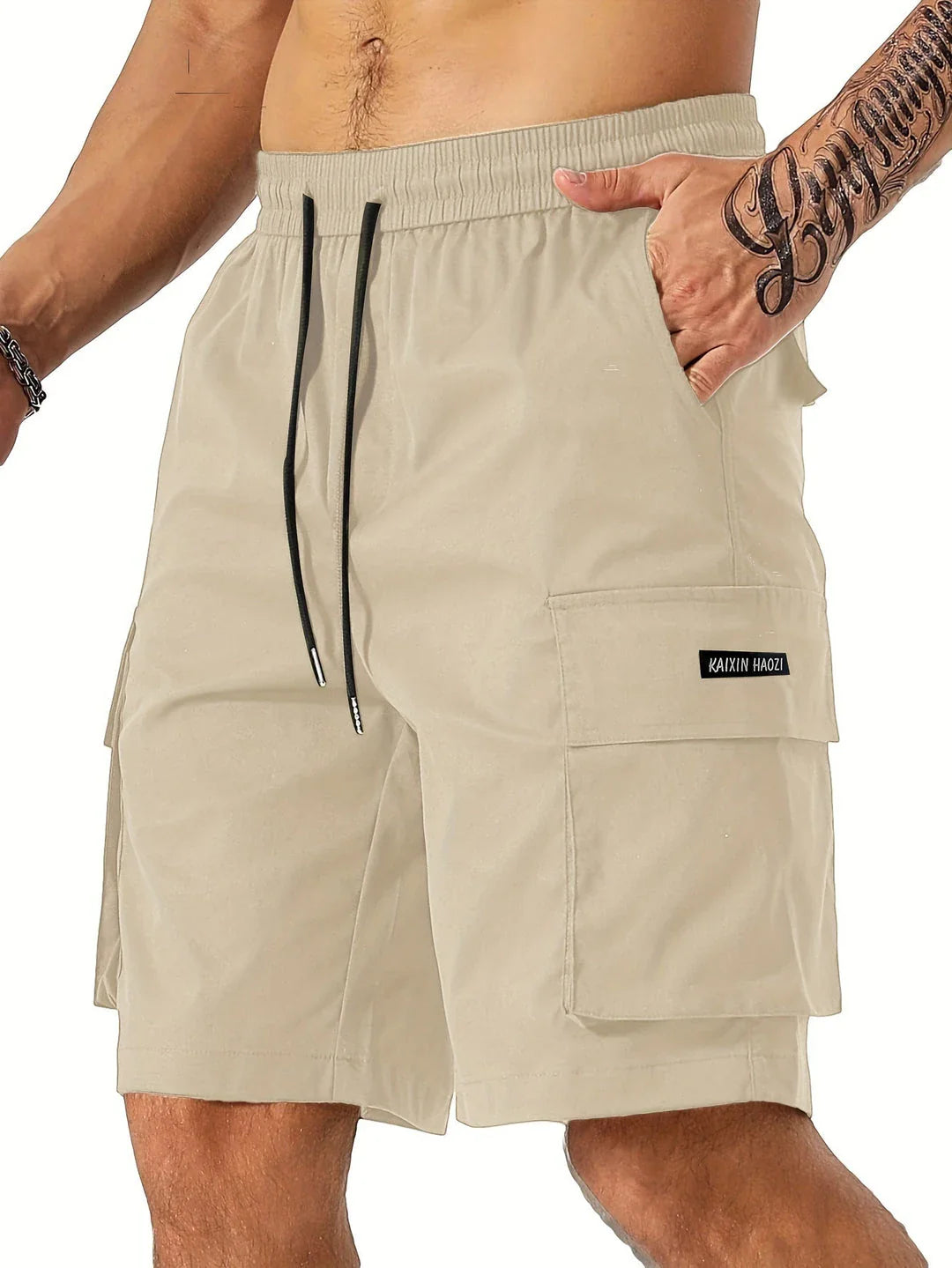 Drawstring waist men's multi-pocket workwear shorts in various colours, designed for comfort and functionality on the job site or for DIY projects.
