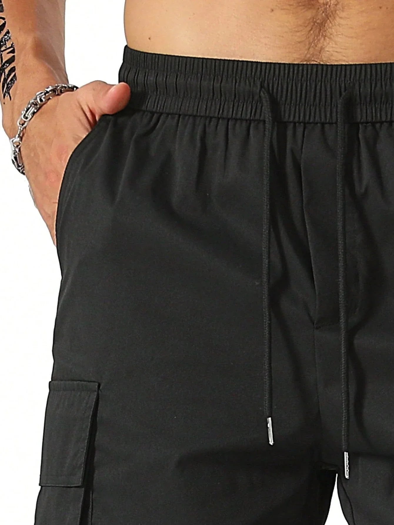 Drawstring waist men's multi-pocket workwear shorts in various colours, designed for comfort and functionality on the job site or for DIY projects.
