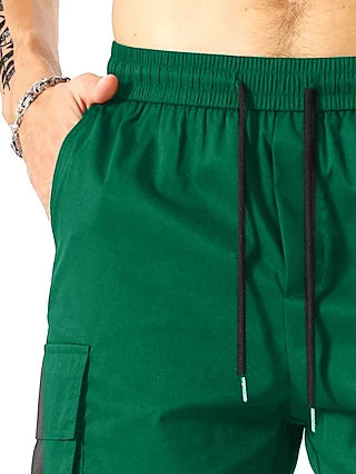 Drawstring waist men's multi-pocket workwear shorts in various colours, designed for comfort and functionality on the job site or for DIY projects.