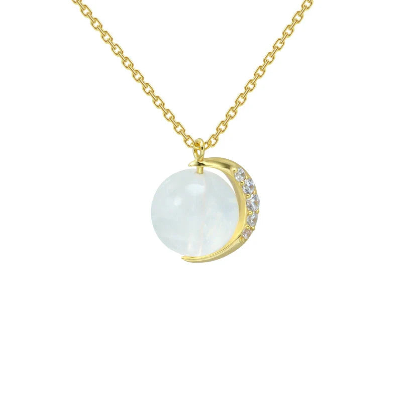 Elegant silver crescent moon necklace with sparkling stones, a timeless celestial accessory