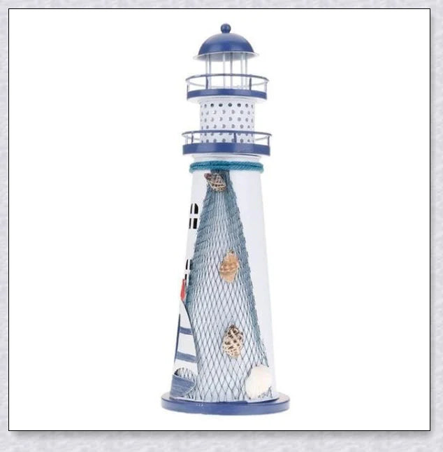 Oceanica LED Lighthouse Lantern Nightlight with nautical details like a small boat, life buoy, and seashells, providing a soft warm glow.