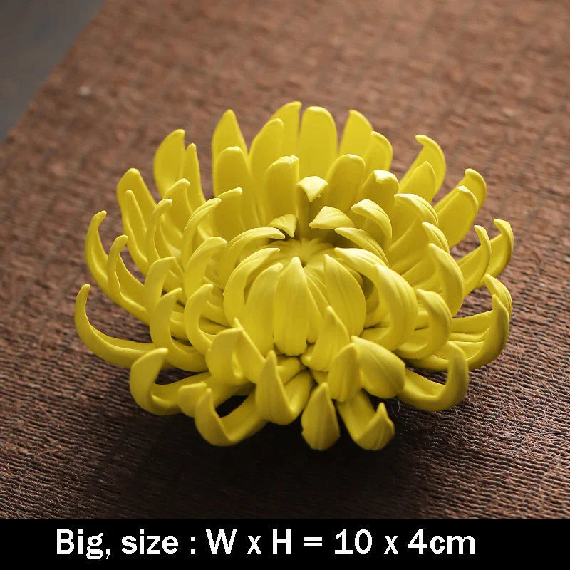 Elegant ceramic incense burner with chrysanthemum design, available in white and yellow colours and three sizes