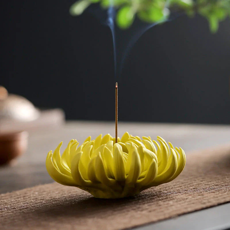 Elegant ceramic incense burner with chrysanthemum design, available in white and yellow colours and three sizes
