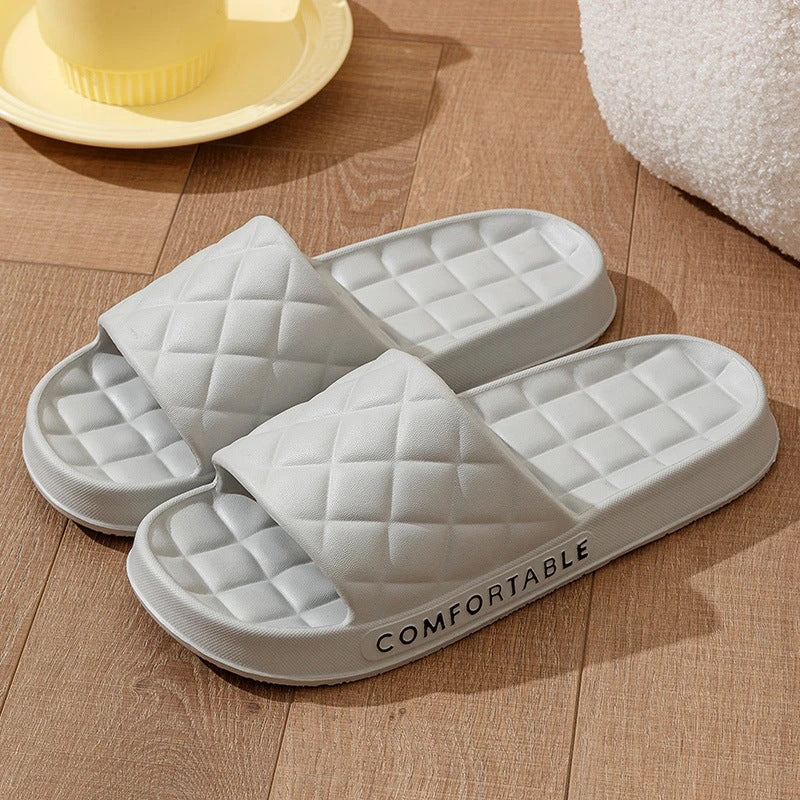 Cozy plaid indoor slippers with soft, silent, and waterproof EVA construction for comfortable all-day wear