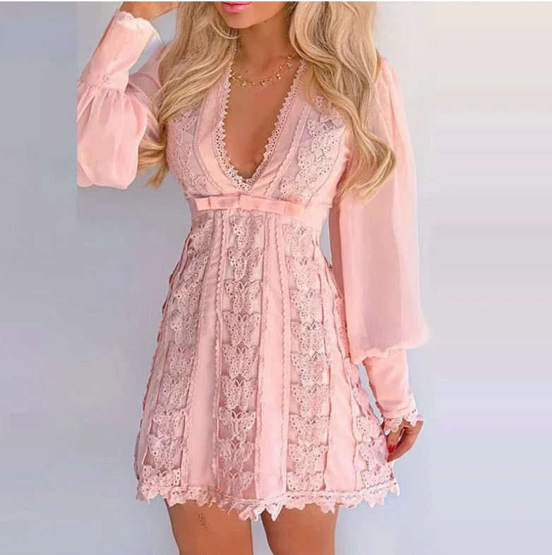 Elegant white lace dress with butterfly sleeves and a high-waist design, perfect for special occasions.