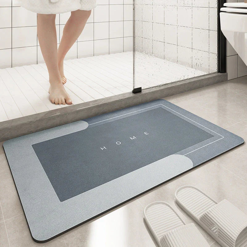 Plush, machine-woven bathroom mat with non-slip surface, available in rectangle and oval shapes in a variety of colours.