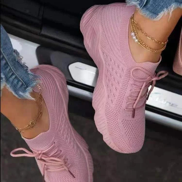 Women's Knit Sneakers in various colors, featuring a lightweight, breathable design and cushioned soles for all-day comfort.