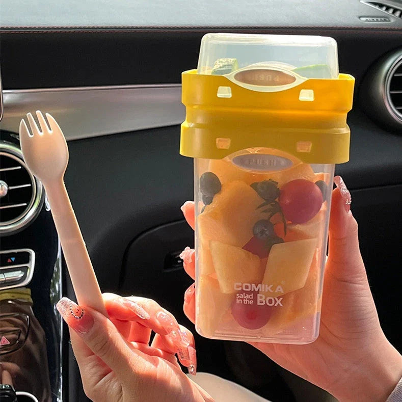 Dual-layer meal prep container with separate compartments and leak-proof lid, available in yellow and cream white colors