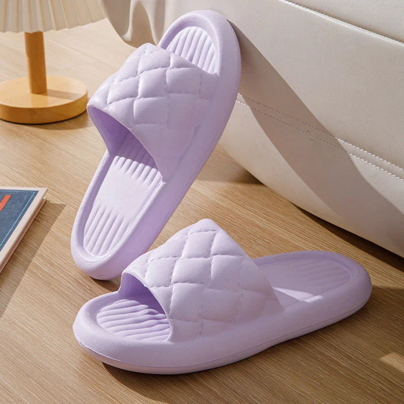 Comfortable and lightweight home slippers with a unique rhombus pattern, waterproof and odor-resistant EVA material, and a non-slip sole for safe indoor wear.