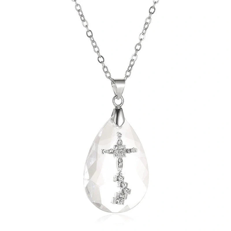 Elegant white drop pendant necklace with cross-chain design, made of premium electroplated alloy for a timeless and sophisticated look.