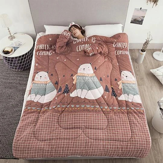 Cozy quilted lounger with sleeves in various colors and sizes, perfect for year-round indoor comfort and relaxation.