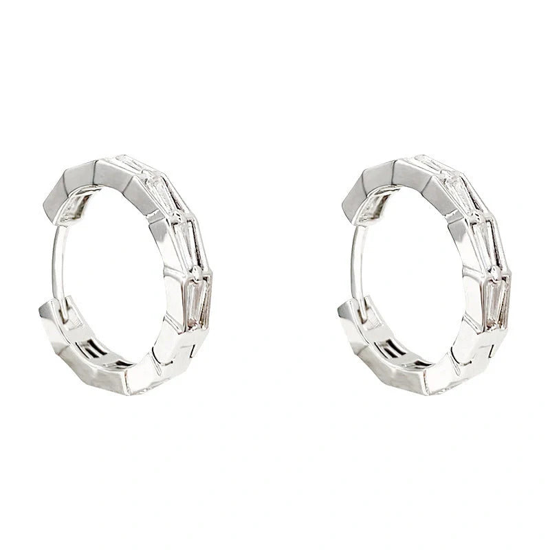 Elegant sterling silver drop earrings featuring sparkling zircon gemstones in a modern geometric design