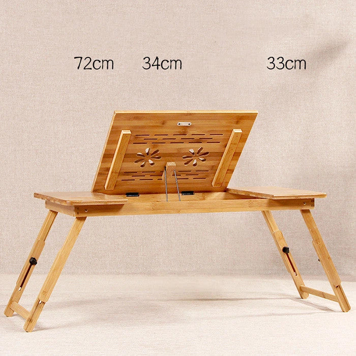 Ergonomic bamboo laptop desk with storage drawers, adjustable legs, and cooling fan for comfortable home office use