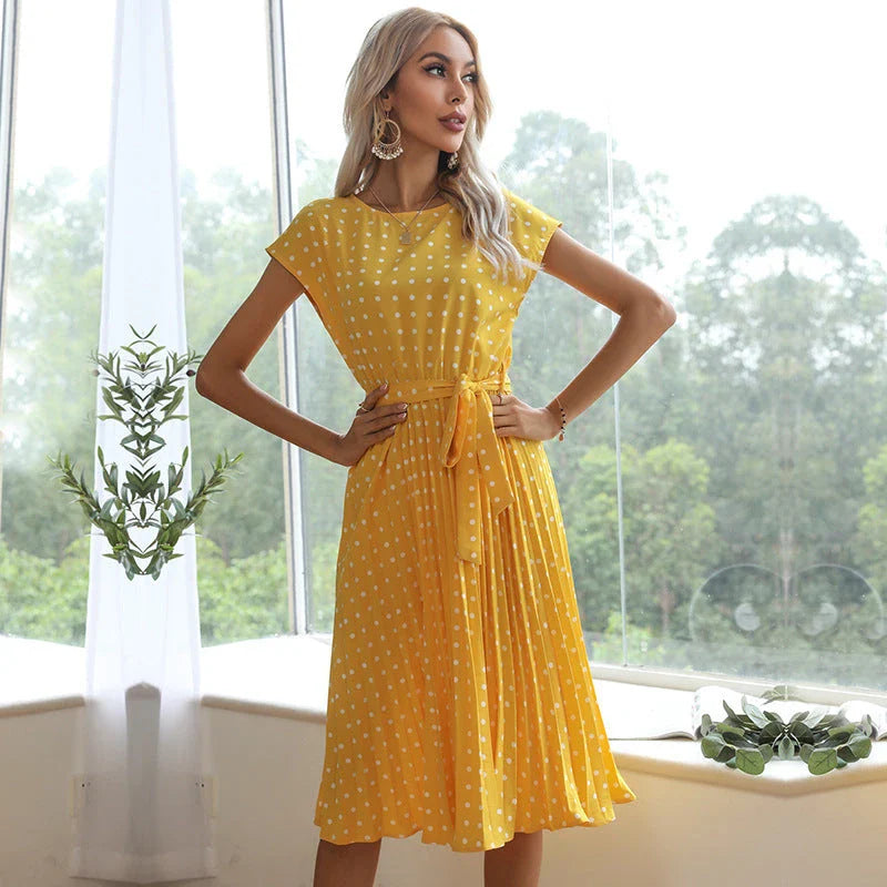 Stylish polka dot midi dress with short sleeves, pleated skirt, and hidden lining for a smooth, non-see-through fit