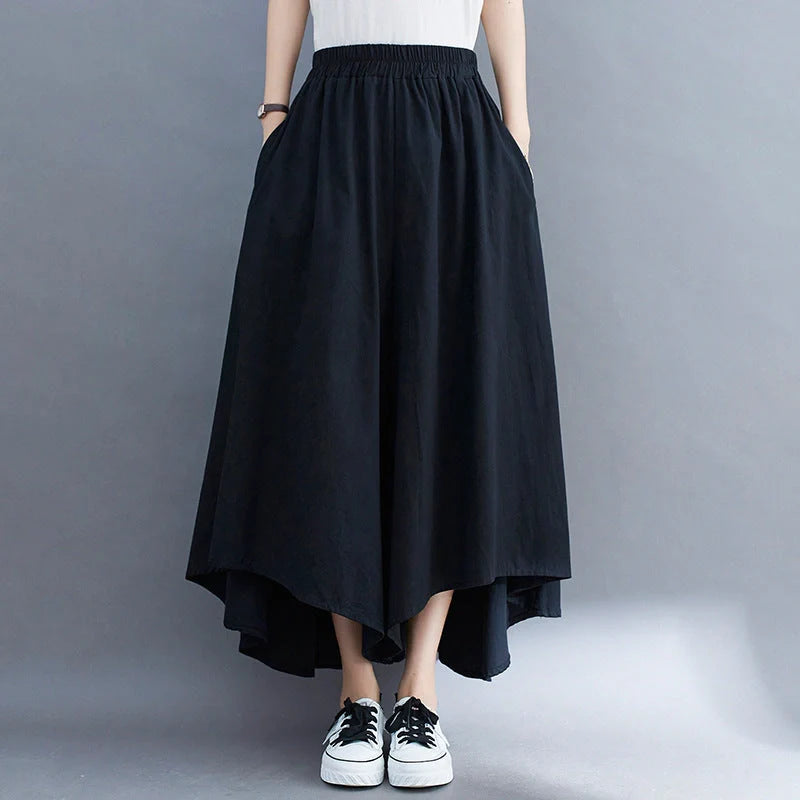 Stylish ladies' loose cropped trousers in various colours, including black, light green, blue, and apricot