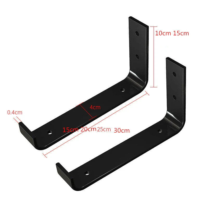 Sturdy black iron wall shelves in three sizes for displaying books, decor, and more in a rustic home setting