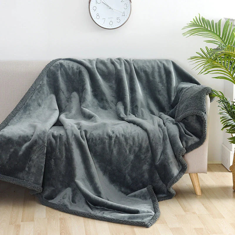 Plush Sherpa Pet Blanket in various colors and sizes, designed for comfort and warmth for your furry friend