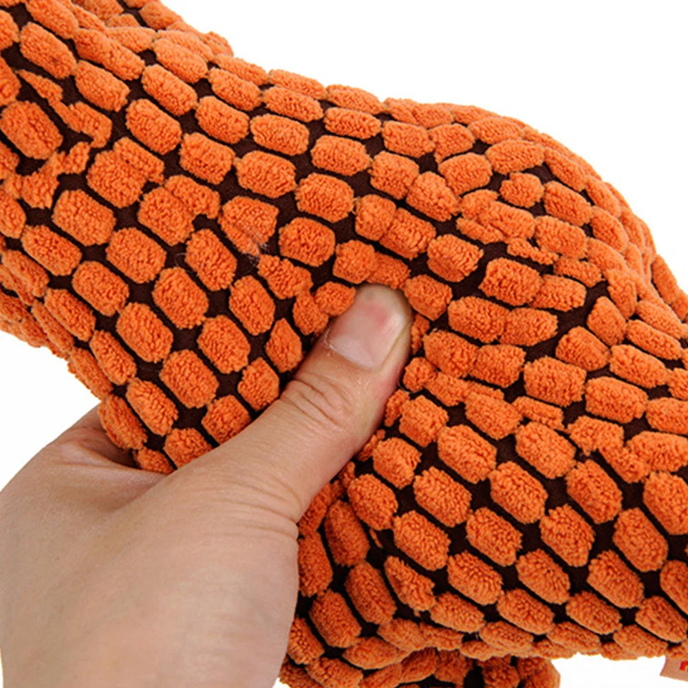 Dinosaur-themed plush chew toys for large dogs, featuring durable corn velvet exterior and soft, squeaky filling materials