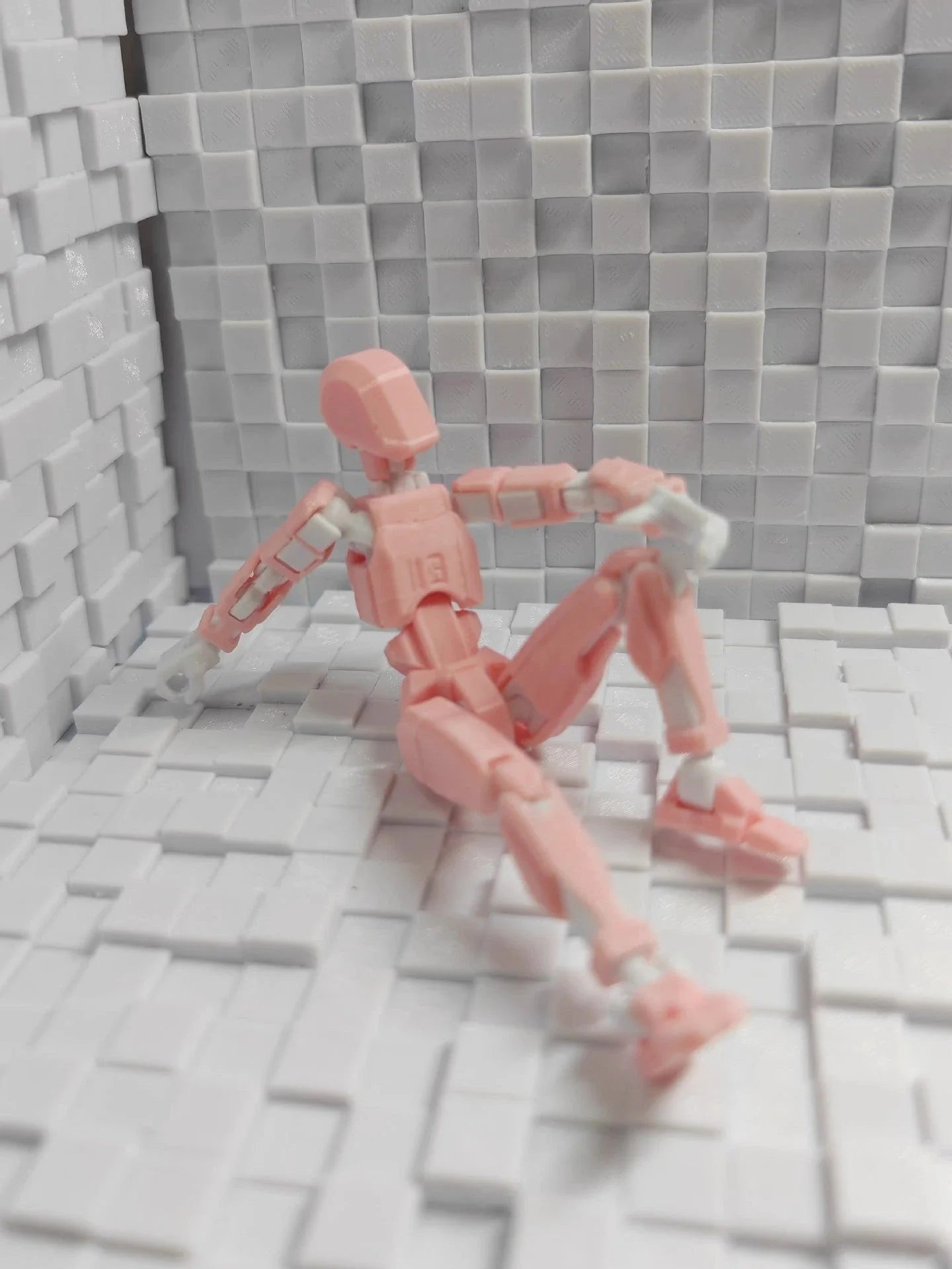 Poseable 3D-printed transforming robot action figure toy in various bright colors