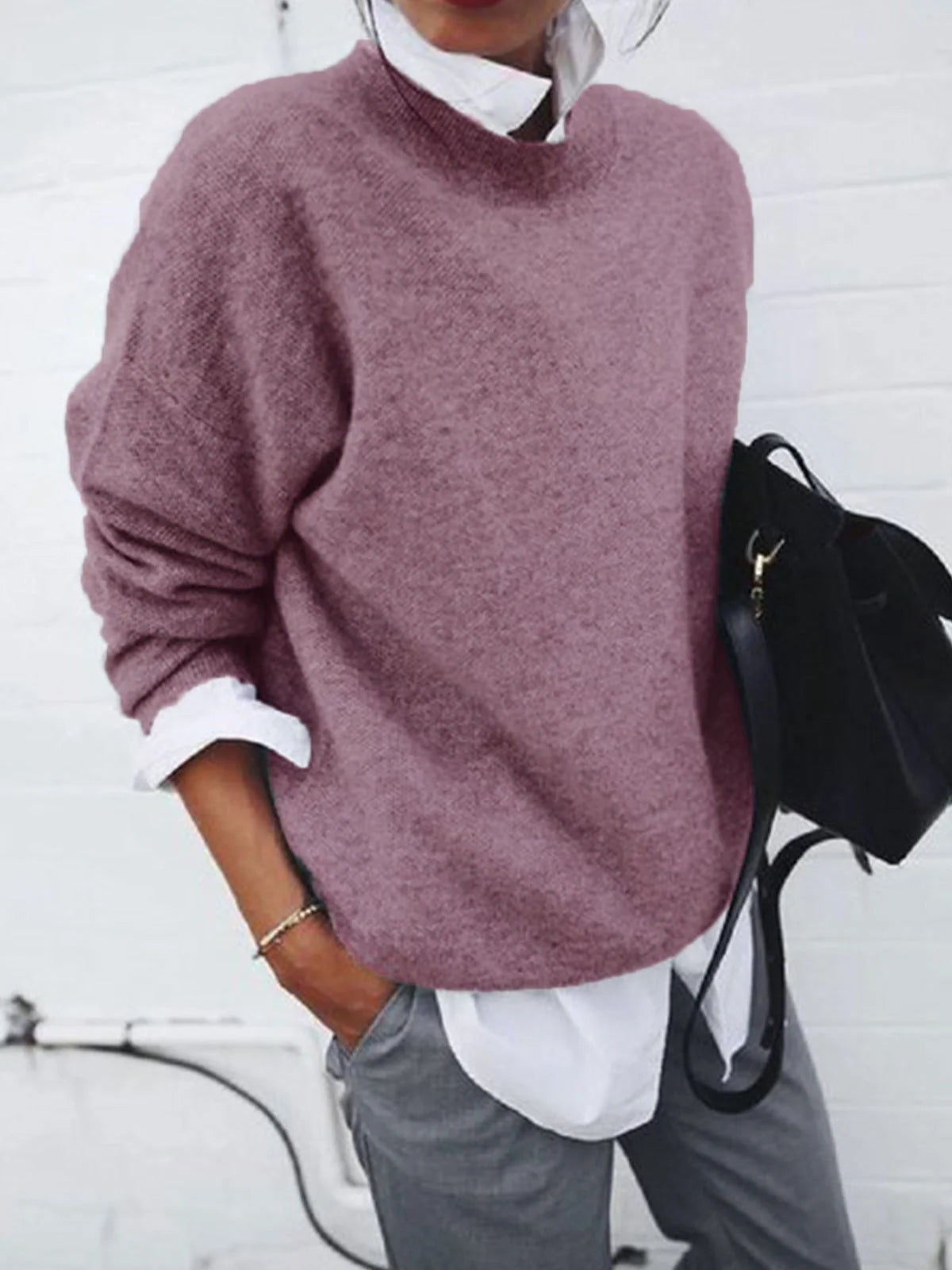 A long sleeve knitted jumper in various solid colours, including light gray, black, khaki, blue, and pink
