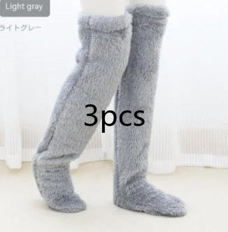 Cozy over-the-knee fuzzy socks in various colors, including brown, blue, dark gray, and pink purple