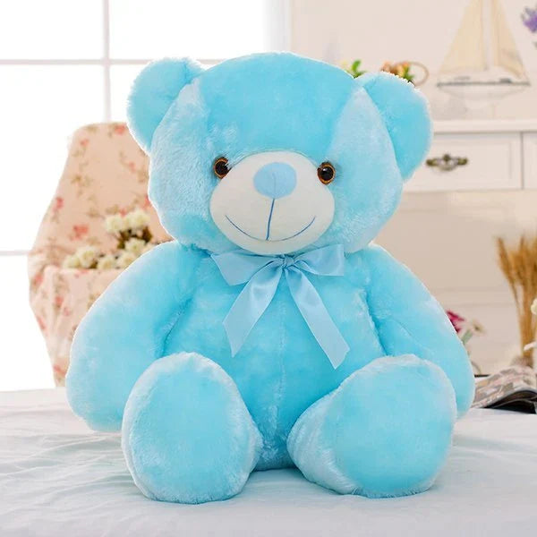A soft and cuddly teddy bear plush toy with captivating color-changing LED lights, perfect for bringing wonder and delight to a child's room.