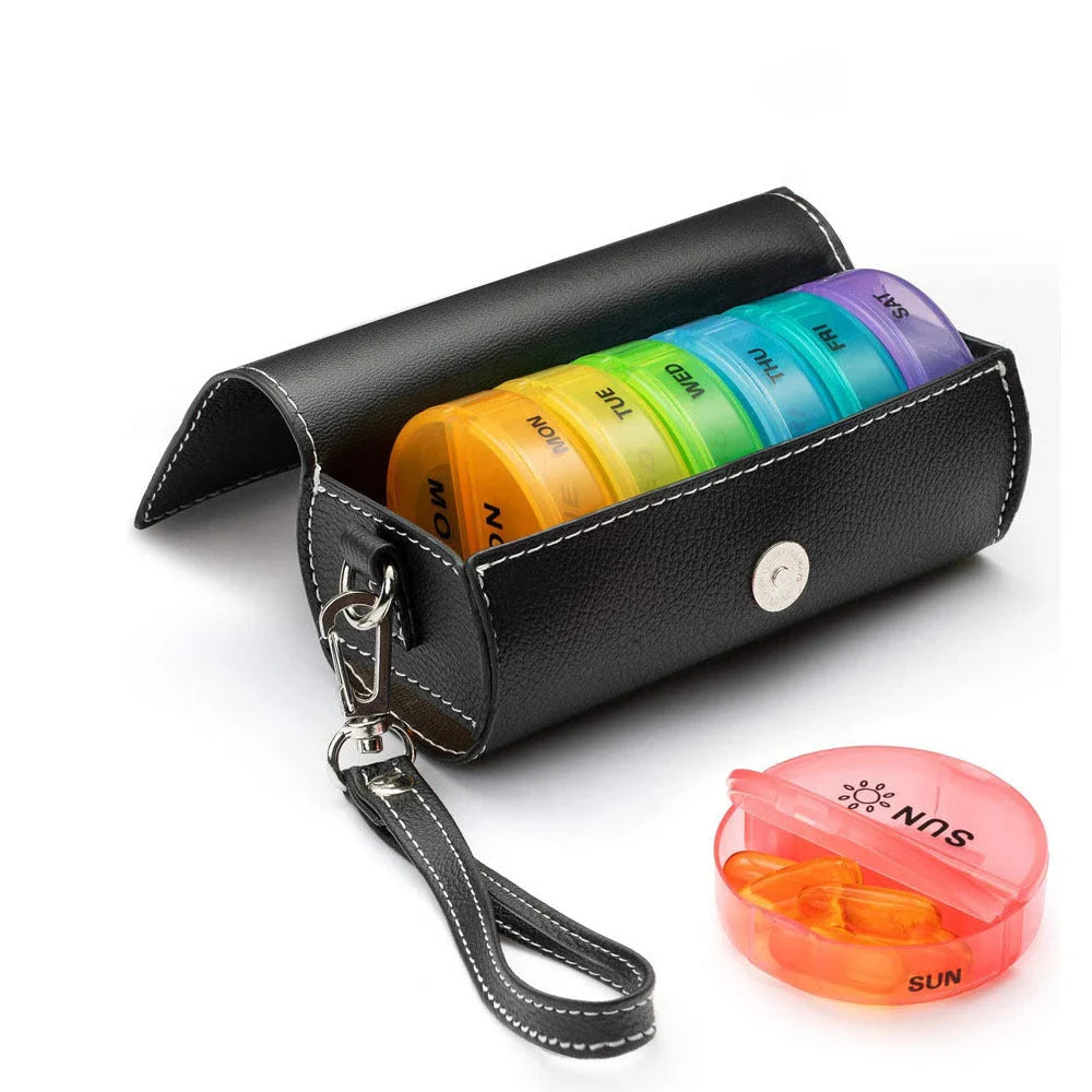 A black plastic 7-day pill organiser with rotating compartments and hidden storage for secure medication management