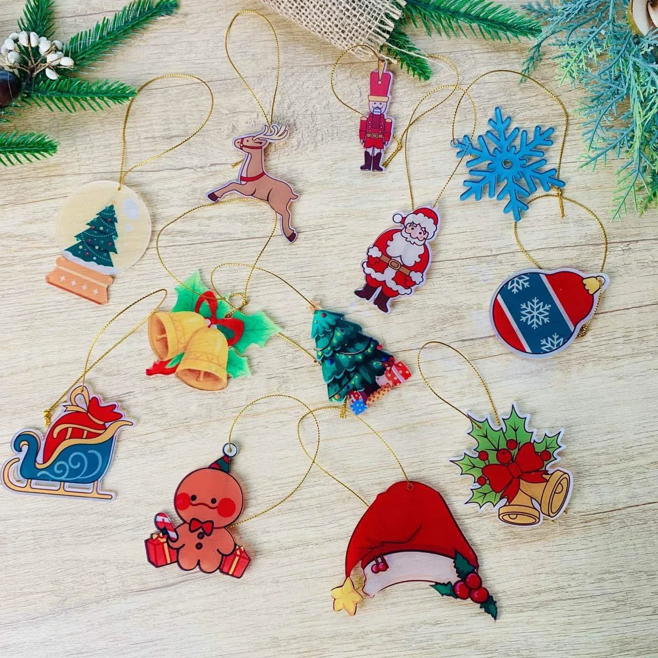 Festive car ornament hanging from rearview mirror with Christmas designs
