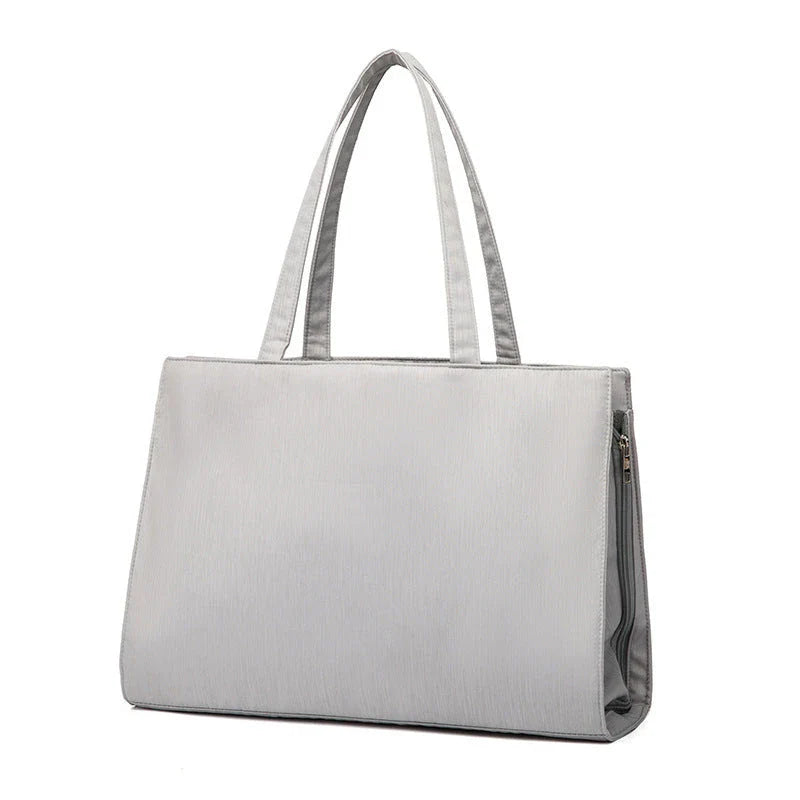 A premium quality mother and baby bag made from soft, durable Oxford cloth with a large 20-35L capacity, versatile backpack or shoulder bag design, and customisable interior pockets.