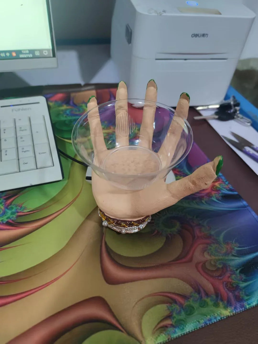 Bewitching Halloween snack bowl stand with transparent bowls and unique witch's hand design