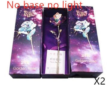 A luxurious 24K gold-plated rose flower bouquet set with a gift box and tote bag