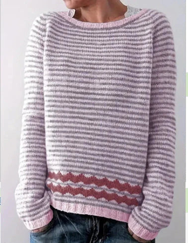 A stylish loose-fit knit jumper with a variety of colourful patterns and designs