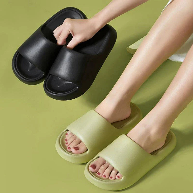 Comfortable EVA foam slip-on slippers in various colors, featuring non-slip soles and a breathable design for indoor and bathroom use.