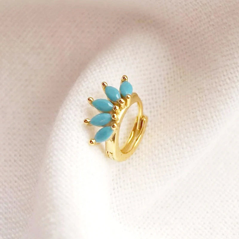Elegant British-inspired Horse Eye Stone Earrings with a mesmerising symmetrical design and premium precious stones