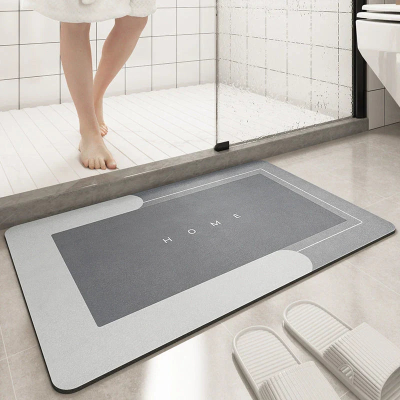 Plush, machine-woven bathroom mat with non-slip surface, available in rectangle and oval shapes in a variety of colours.