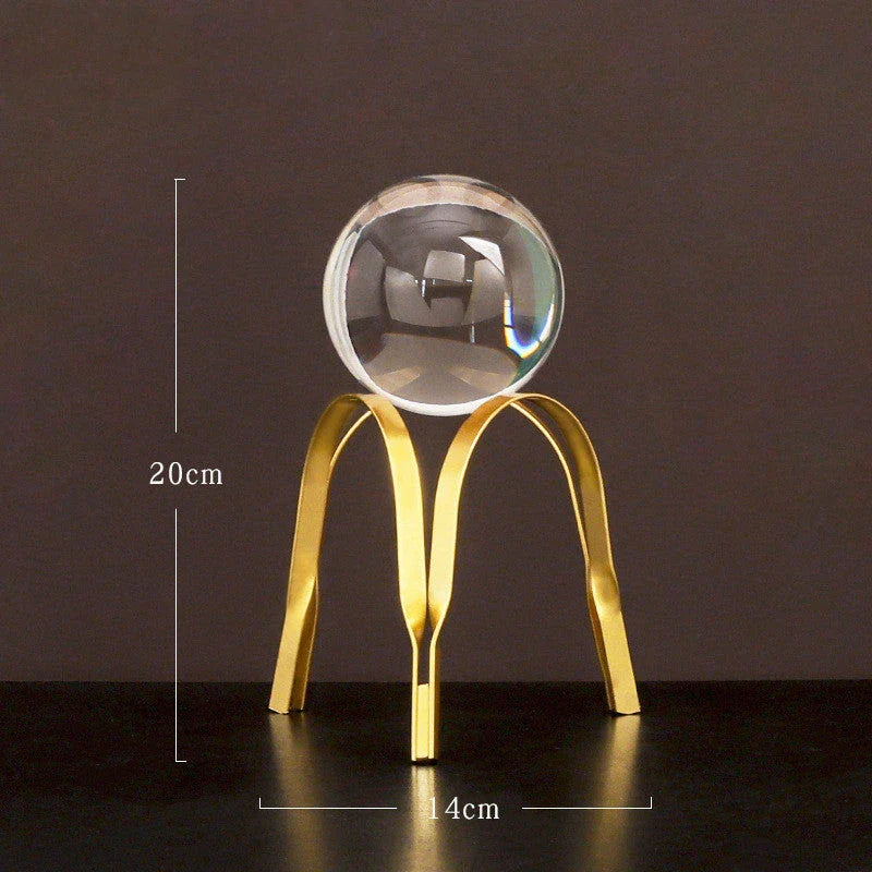 Elegant crystal ball home decor ornaments with a luxurious golden metal finish and minimalist modern design