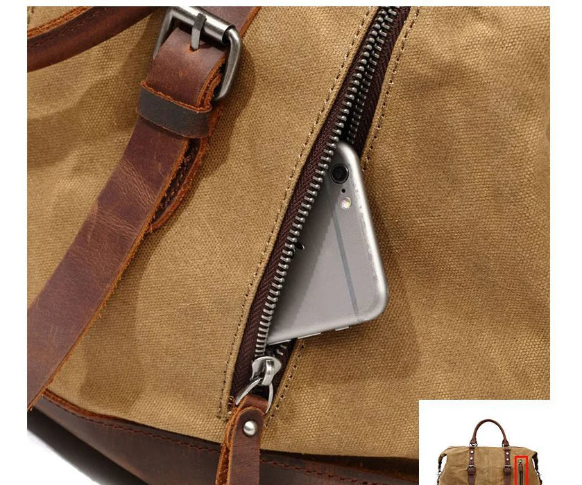 A large, khaki-coloured canvas crossbody luggage bag with multiple pockets and compartments for organised travel