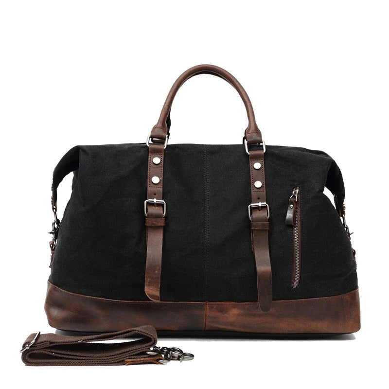 A large, khaki-coloured canvas crossbody luggage bag with multiple pockets and compartments for organised travel
