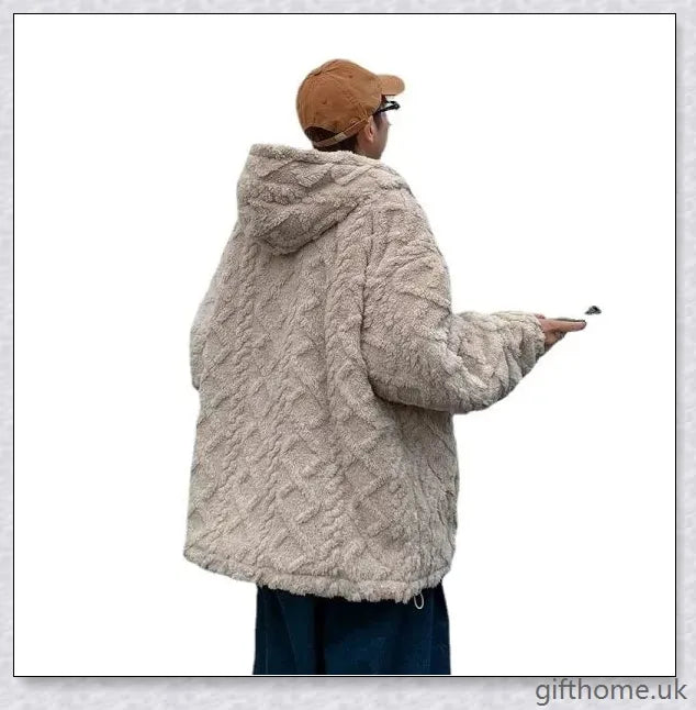 A cosy and stylish American Retro lamb wool padded coat in a soft apricot colour, perfect for staying warm during the British winter.