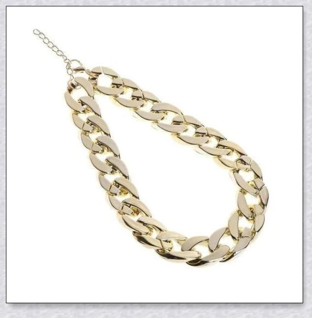 Thick gold chain dog collar with a stylish and durable design, perfect for adding a touch of urban sophistication to your pet's look.