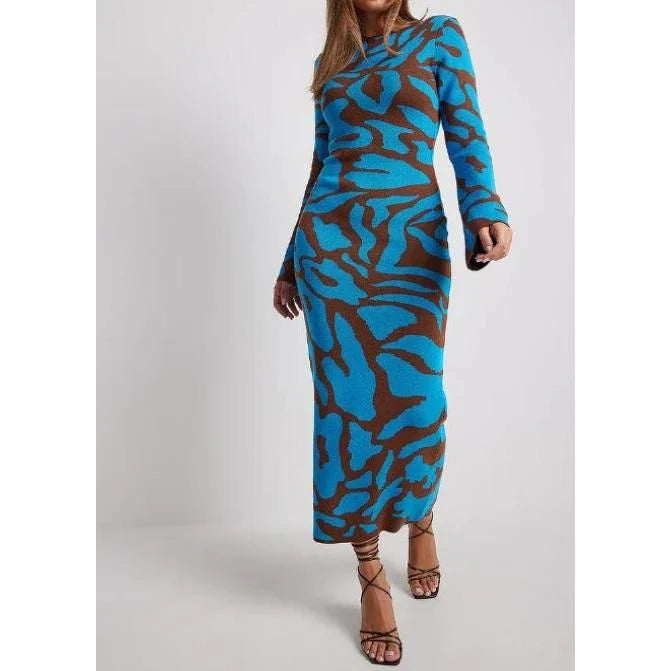 Elegant striped knit midi dress with O-neck, flare sleeves, and ankle-length cut