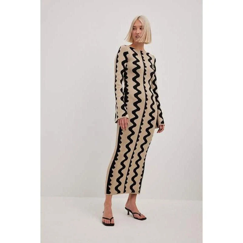 Elegant striped knit midi dress with O-neck, flare sleeves, and ankle-length cut