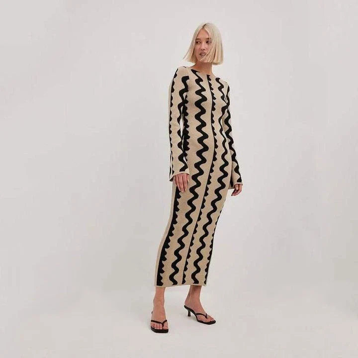Elegant striped knit midi dress with O-neck, flare sleeves, and ankle-length cut