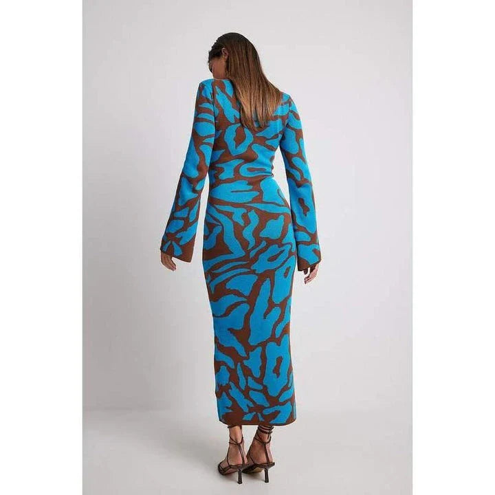 Elegant striped knit midi dress with O-neck, flare sleeves, and ankle-length cut