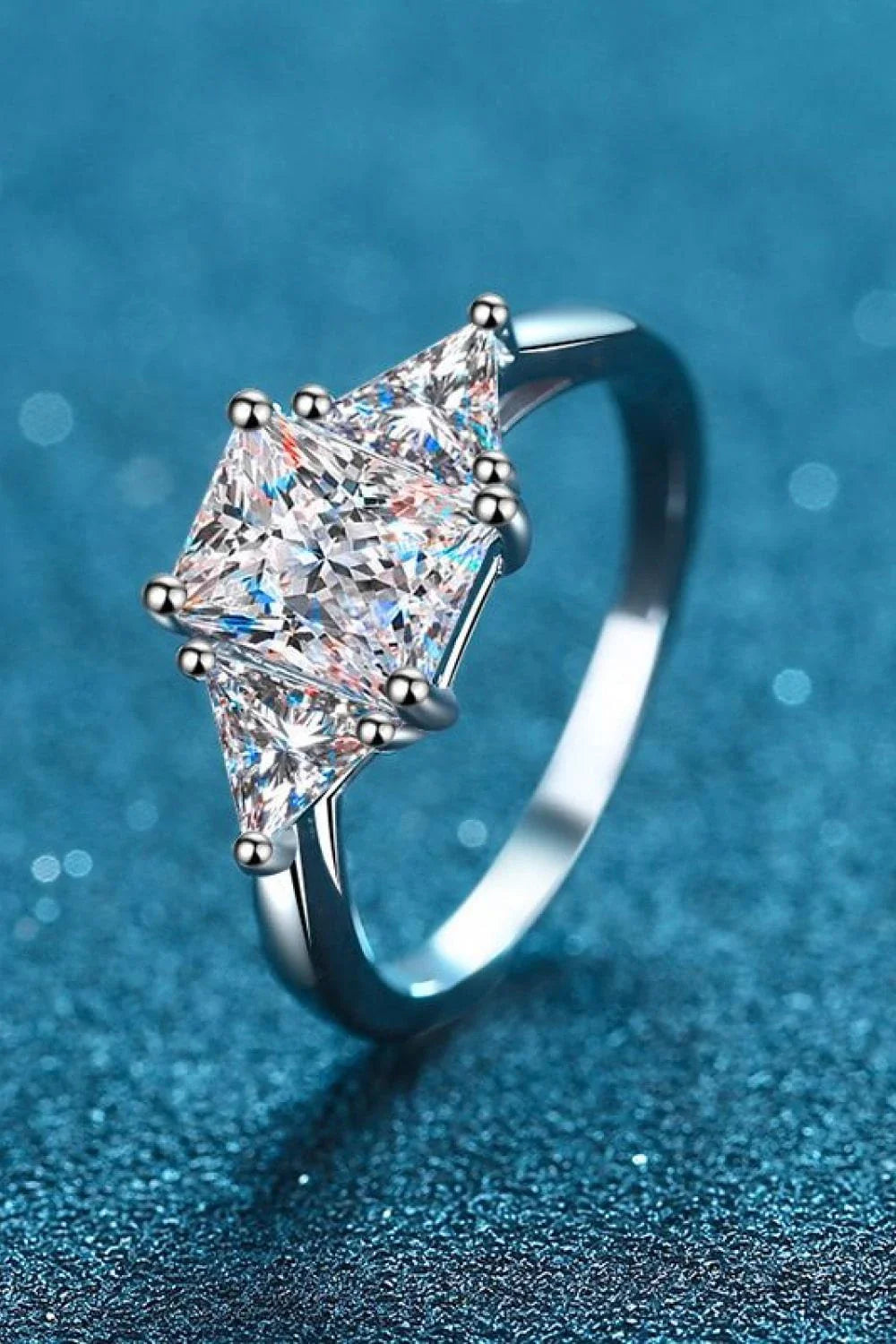 3 carat moissanite sterling silver ring with rhodium plating in a modern, minimalist design