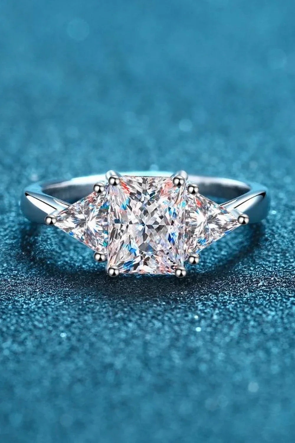 3 carat moissanite sterling silver ring with rhodium plating in a modern, minimalist design