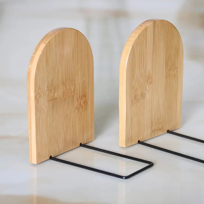 Natural bamboo desktop organizer and bookend with a simple, elegant design that optimises vertical storage space