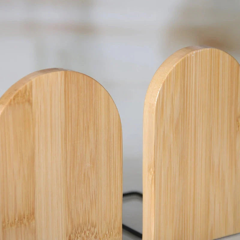 Natural bamboo desktop organizer and bookend with a simple, elegant design that optimises vertical storage space